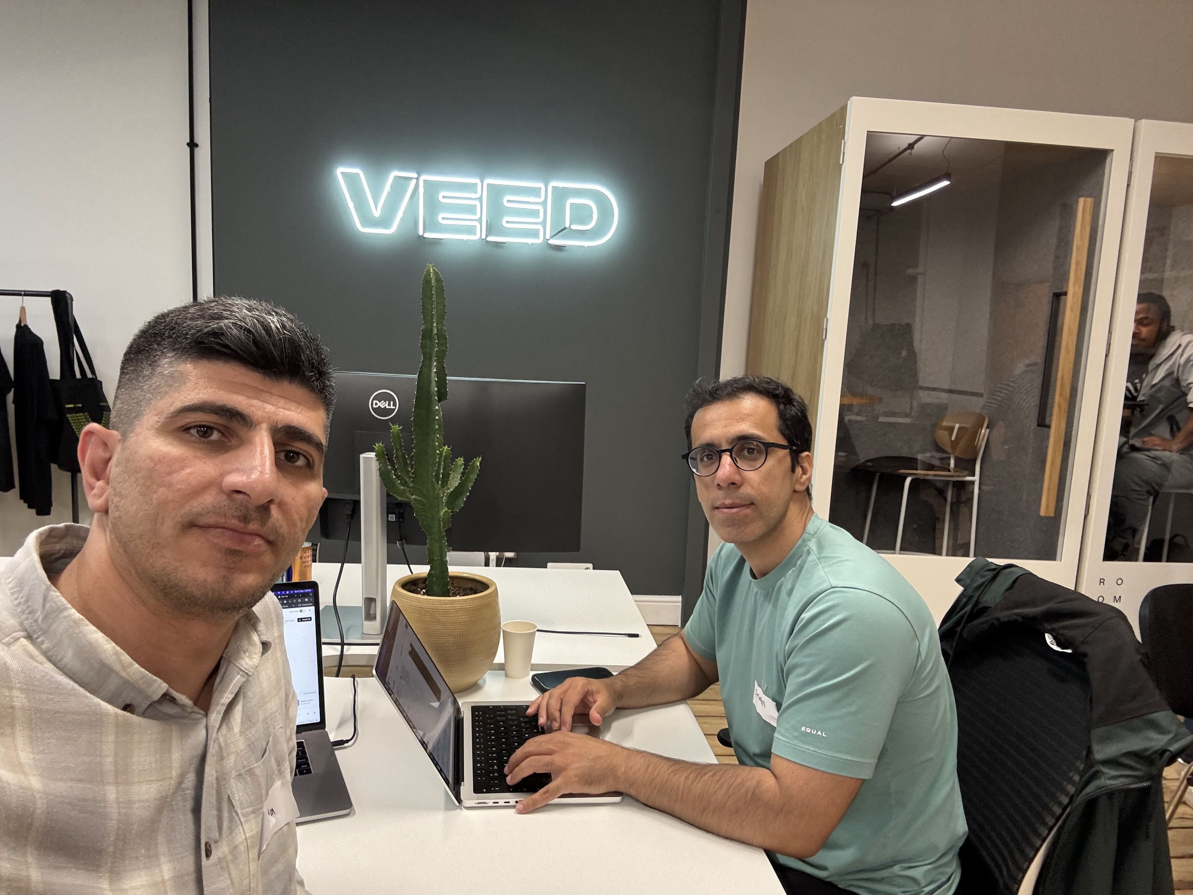Fakhruddin and Sirwan working at VEED office during the hackathon